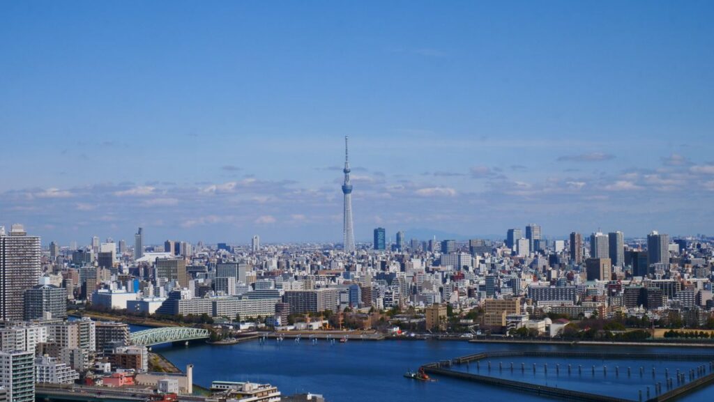 Trip Search Result A breathtaking aerial view of Tokyo's skyline featuring the iconic Tokyo Skytree.