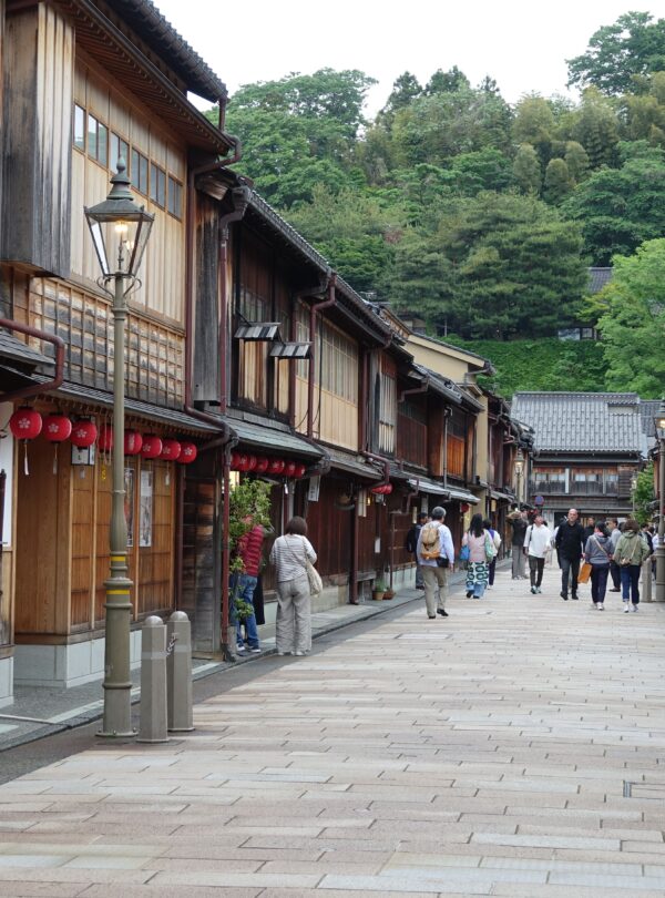 Explore the historic charm of Kanazawa's Higashi Chaya District with its classic wooden architecture.