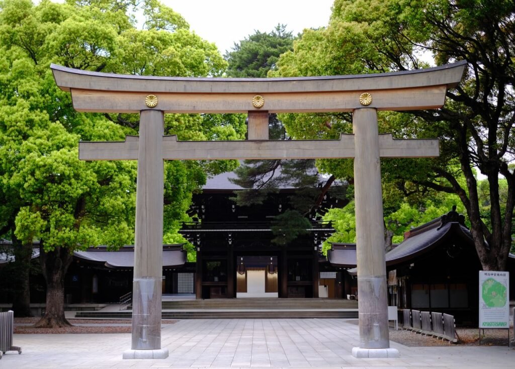 A serene view of the iconic torii gate at the entrance of Meiji Shrine in Tokyo, Japan.